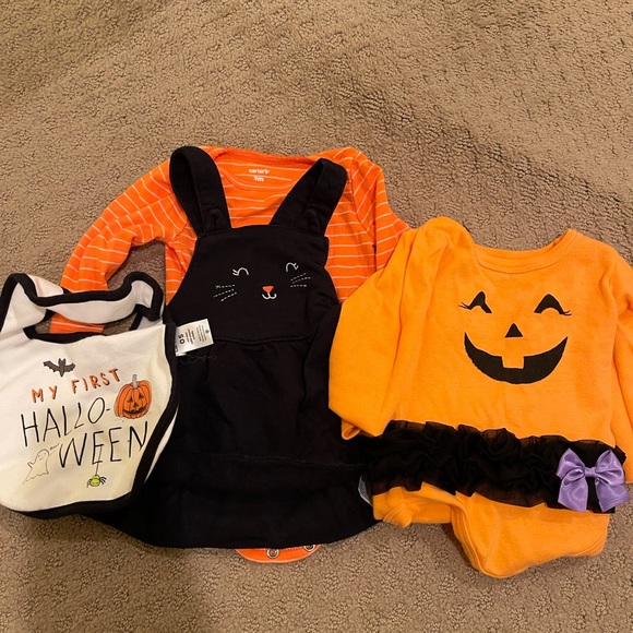 2 body suits, one skirt and a bib - Picture 1 of 1